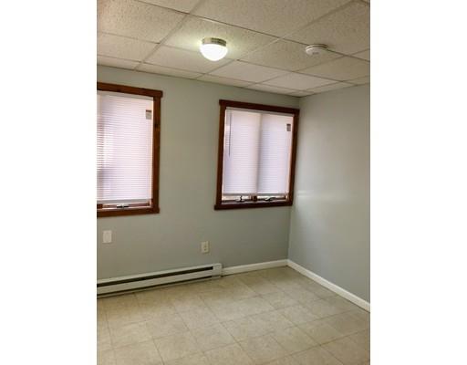 155 Methuen Street Springfield, MA 01119 - Photo 18 of 24 a view of an empty room with a window
