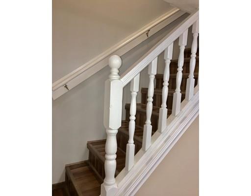 155 Methuen Street Springfield, MA 01119 - Photo 10 of 24 a view of staircase with lots of white walls