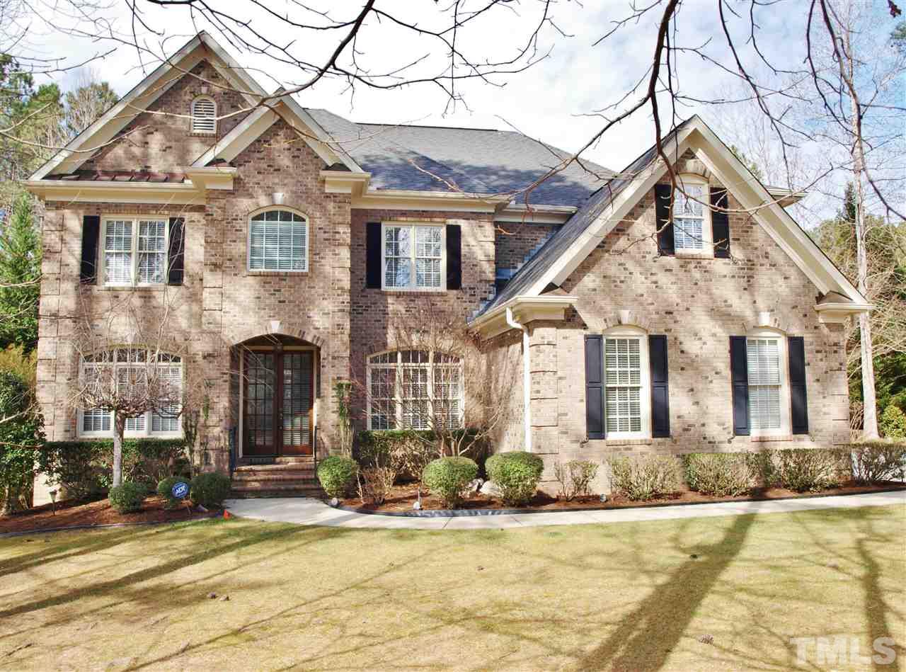 2100 Summer Azure Way Raleigh, NC 27613 - Photo 1 of 25 a front view of a house with a yard