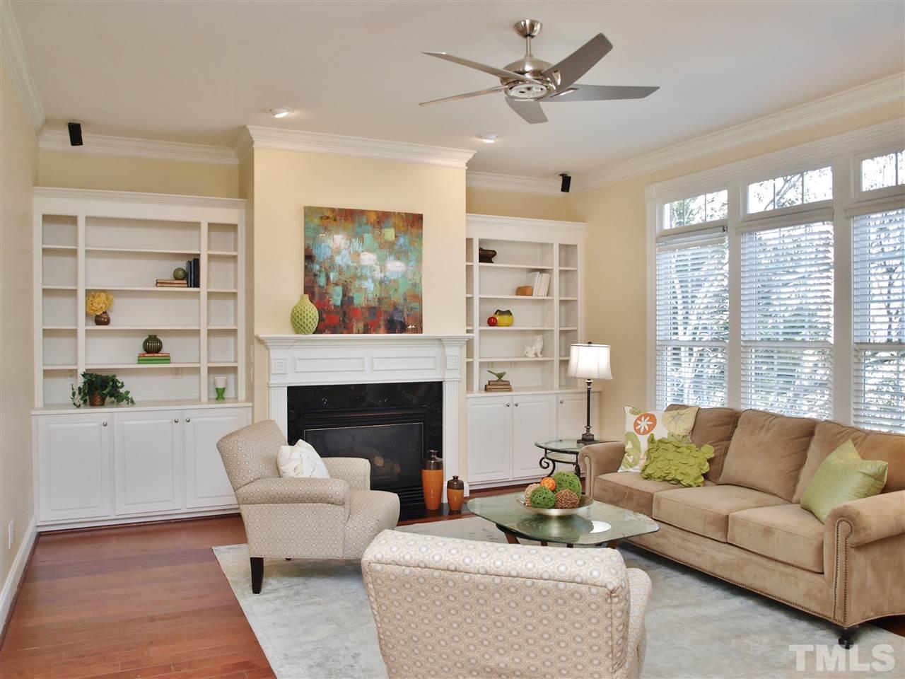 2100 Summer Azure Way Raleigh, NC 27613 - Photo 2 of 25 a living room with furniture and a fireplace
