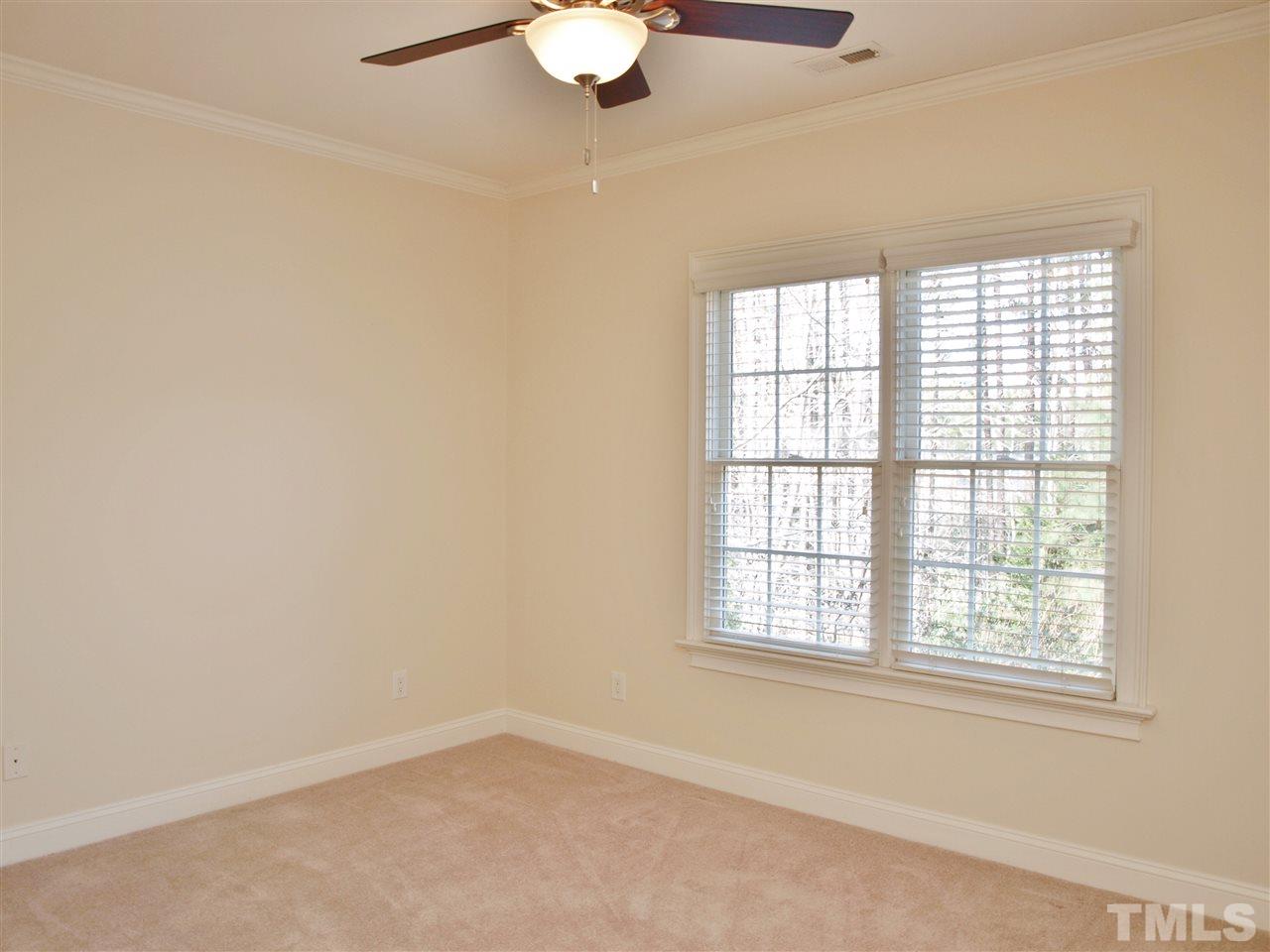 2100 Summer Azure Way Raleigh, NC 27613 - Photo 17 of 25 an empty room with a window