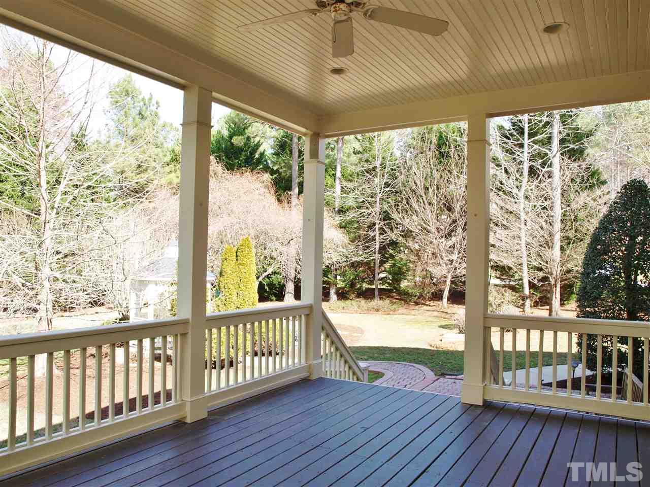 2100 Summer Azure Way Raleigh, NC 27613 - Photo 22 of 25 a view of a porch with wooden floor