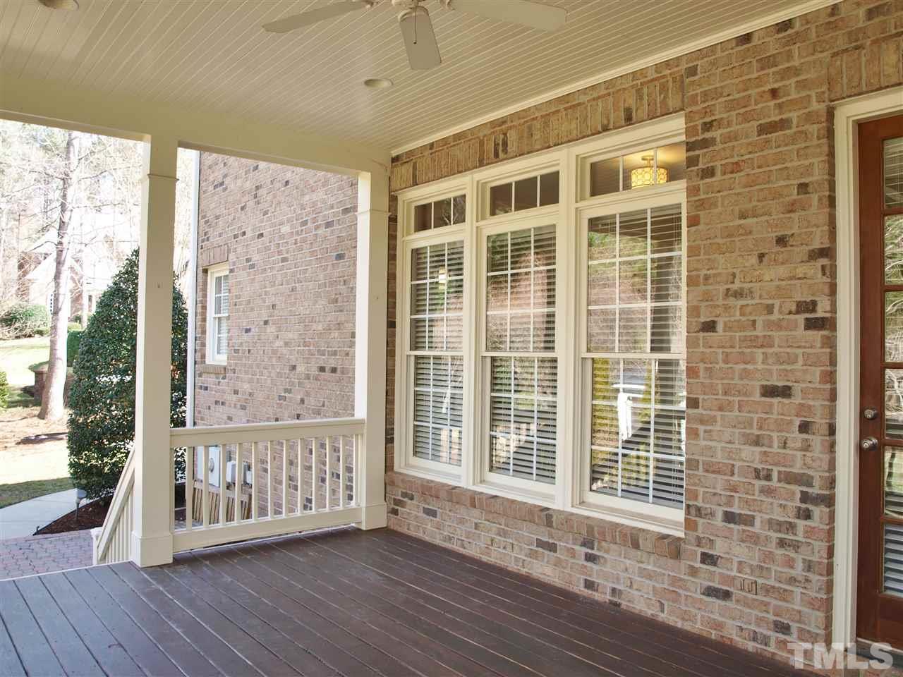 2100 Summer Azure Way Raleigh, NC 27613 - Photo 23 of 25 a view of an empty room with wooden floor and a window