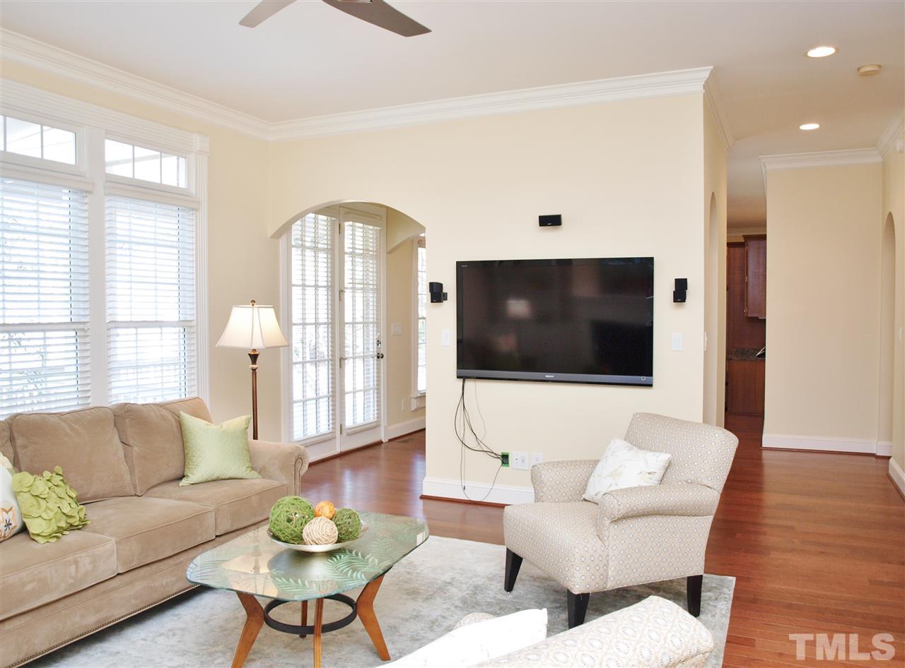 2100 Summer Azure Way Raleigh, NC 27613 - Photo 4 of 25 a living room with furniture and a flat screen tv