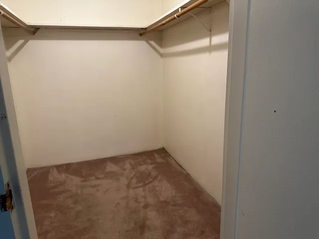 a storage room with washer and dryer