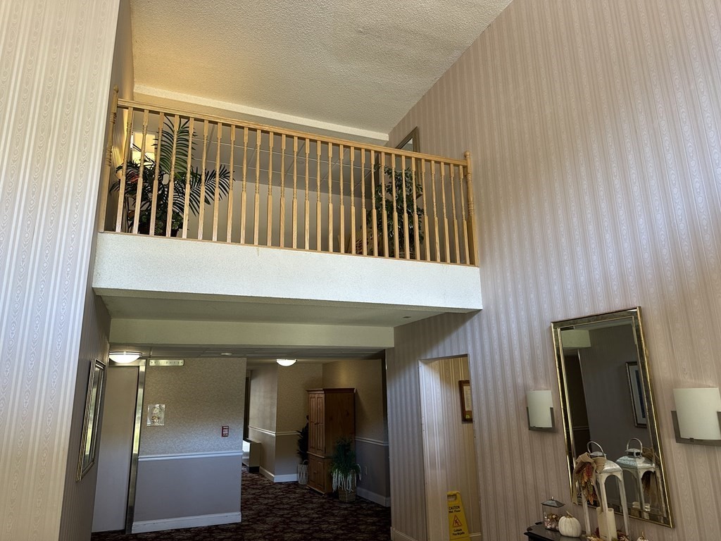 2 Summit Drive, Unit 21 Wakefield, MA 01880 - Photo 5 of 19 a view of staircase with white walls