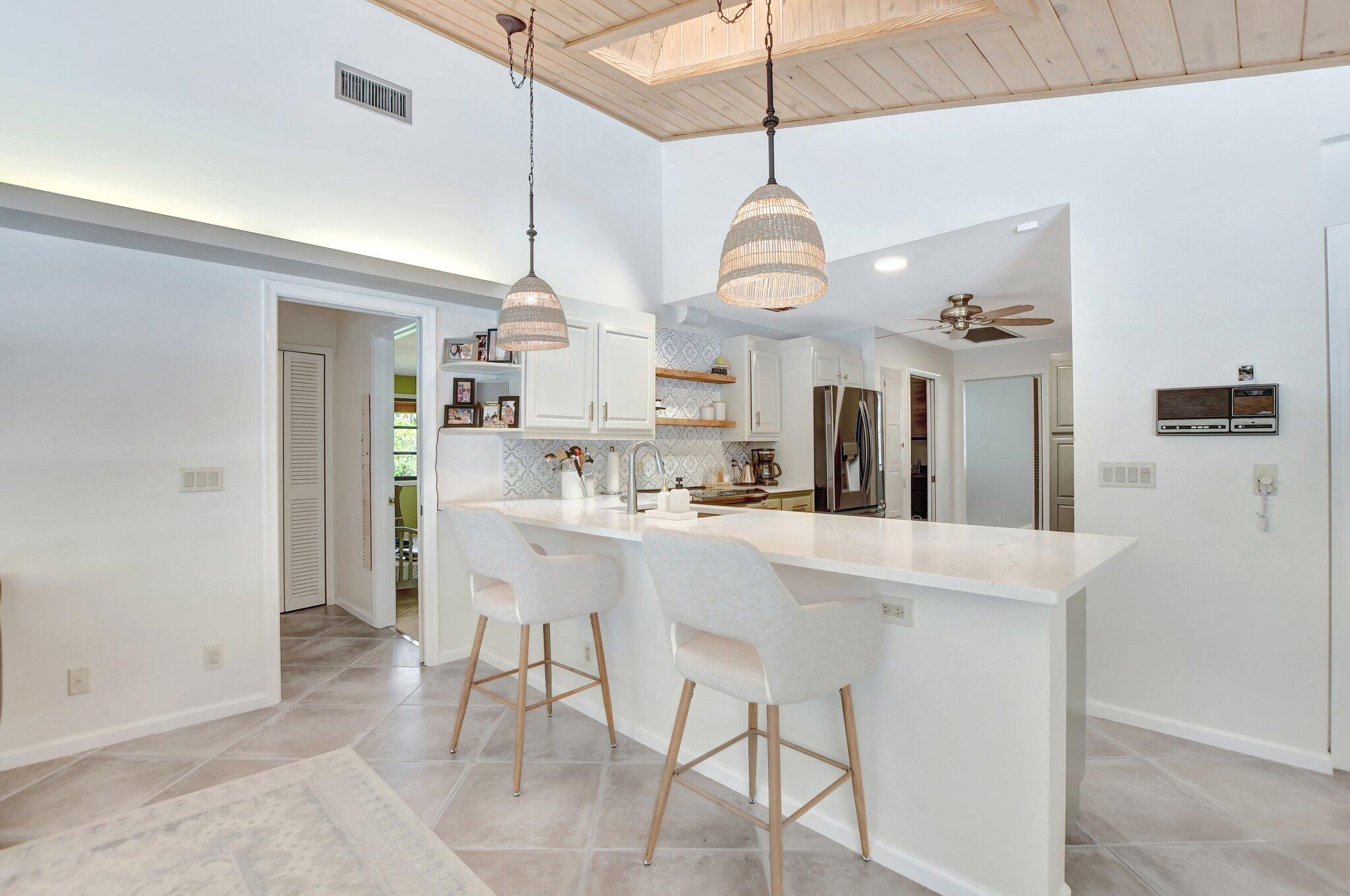 2898 Northwest 26th Street Boca Raton, FL 33434 - Photo 28 of 62 17 Kitchen Facing Family Room