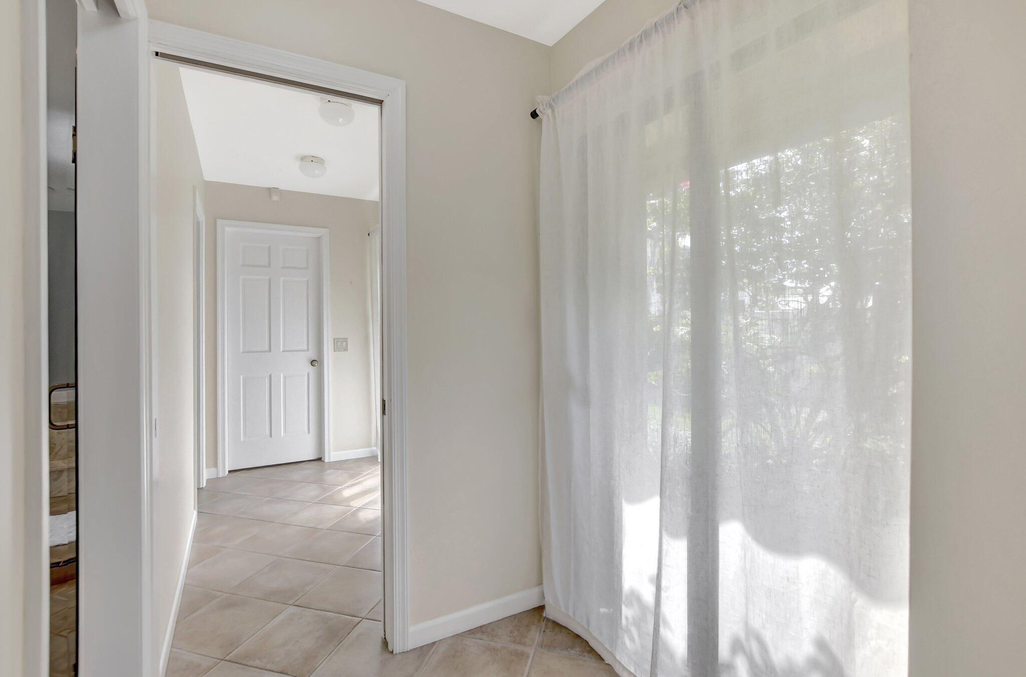 2898 Northwest 26th Street Boca Raton, FL 33434 - Photo 49 of 62 24b Primary Bath and Closets Entry