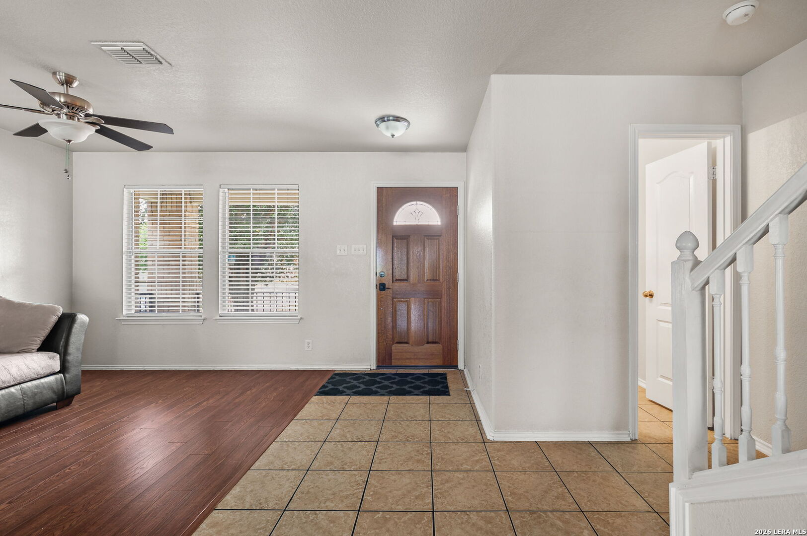 7207 Avery Road Live Oak, TX 78233 - Photo 5 of 32 a view of empty room with wooden floor and fan