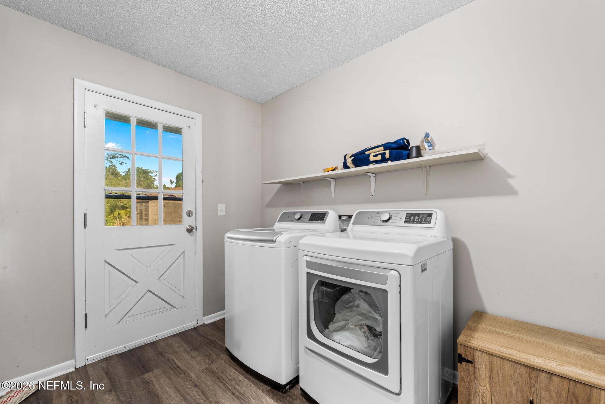5628 Fort Sumter Road Jacksonville, FL 32210 - Photo 29 of 45 a utility room with dryer and washer