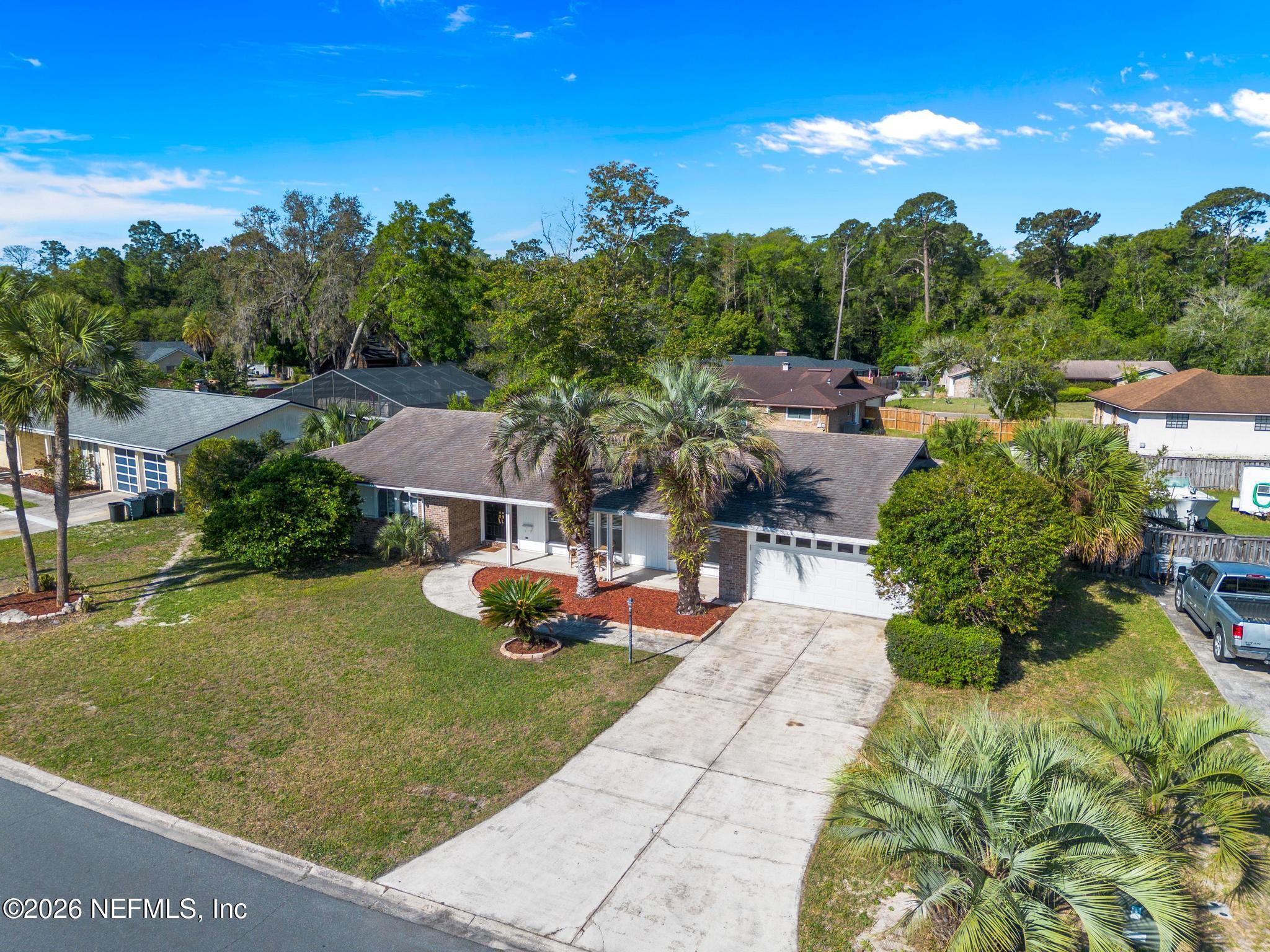 5628 Fort Sumter Road Jacksonville, FL 32210 - Photo 3 of 45 a view of a street with houses