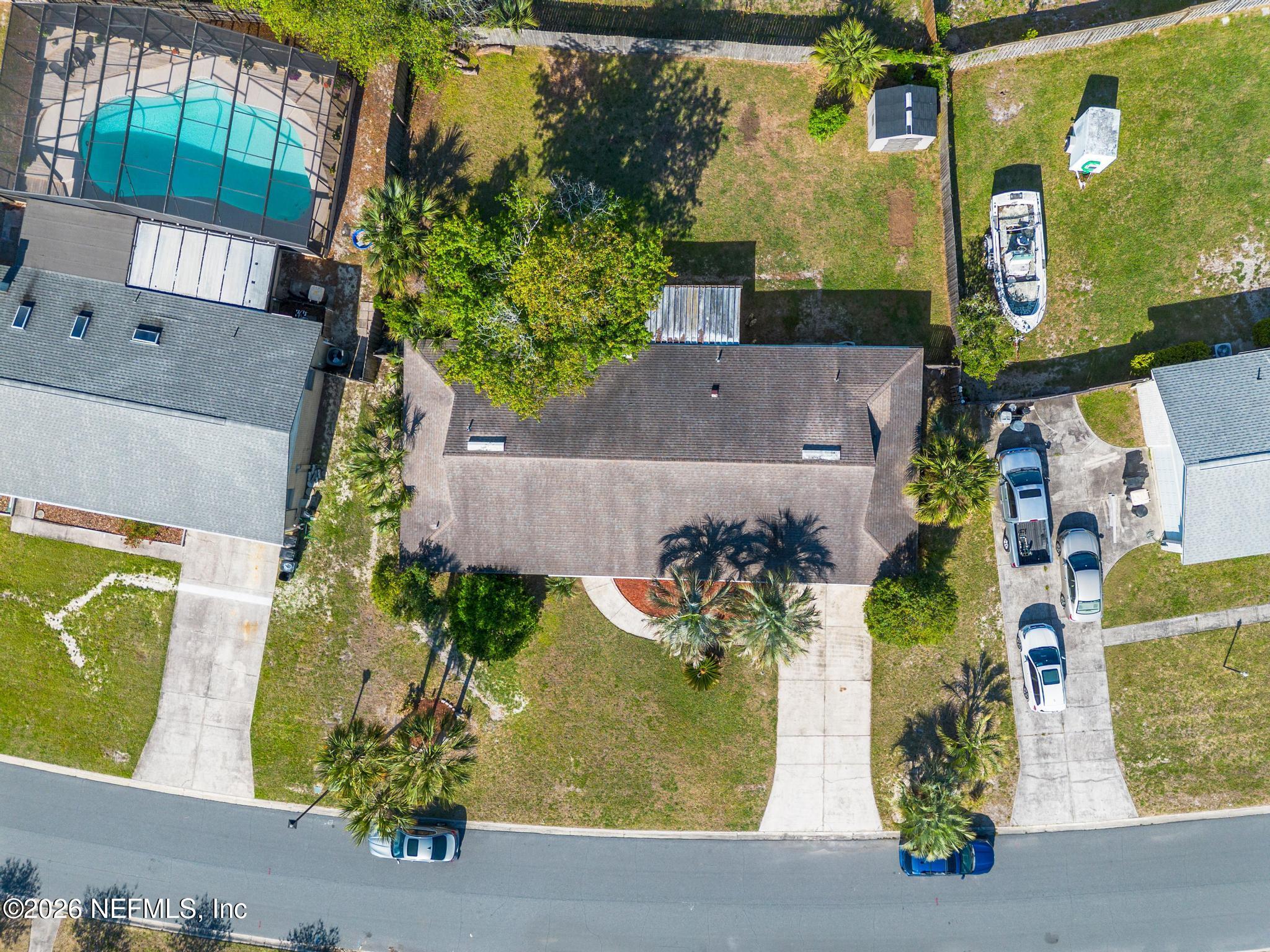 5628 Fort Sumter Road Jacksonville, FL 32210 - Photo 44 of 45 an aerial view of a house with a garden and street view