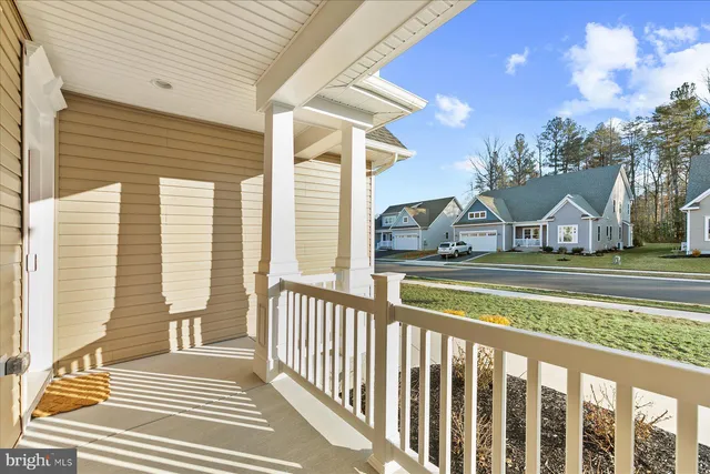 a view of balcony with two chairs