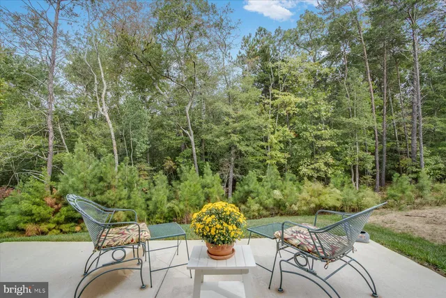 a view of a chairs and table in the outdoor
