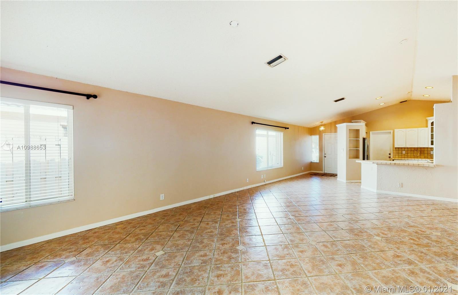 573 Talavera Road Weston, FL 33326 - Photo 5 of 18 Great room looking back to the open kitchen