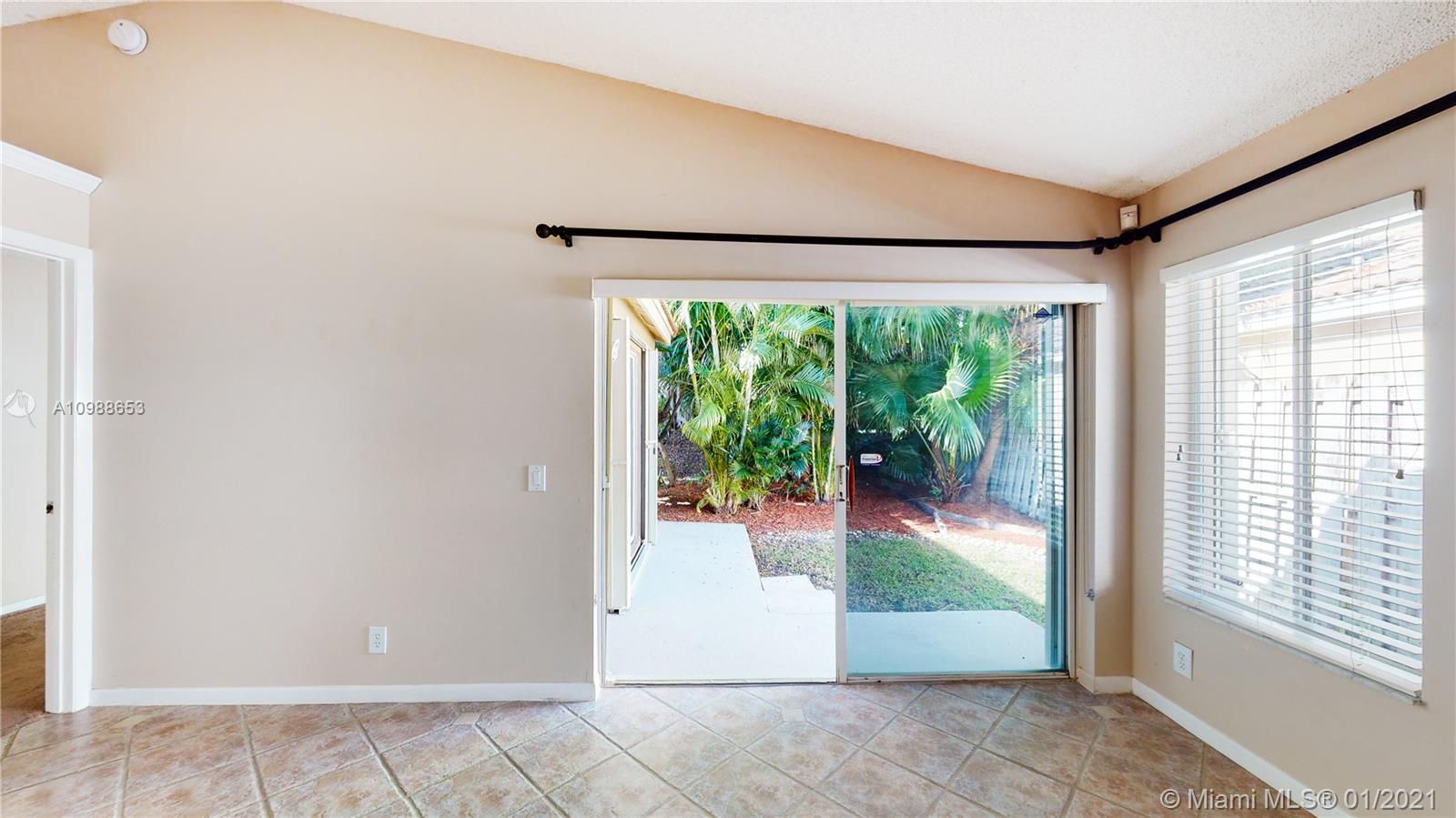 573 Talavera Road Weston, FL 33326 - Photo 9 of 18 Great room view to the back