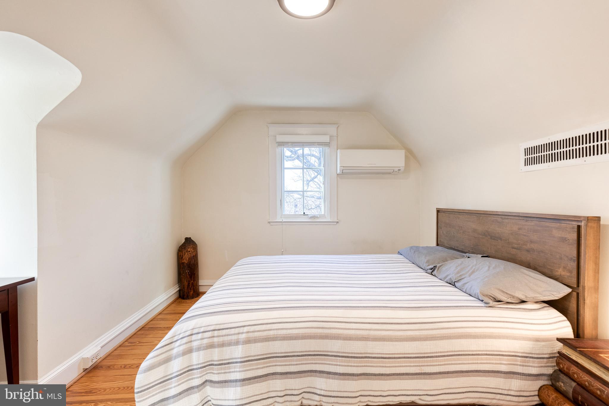 4010 Roundtop Road Baltimore, MD 21218 - Photo 33 of 51 a bedroom with a bed and a window