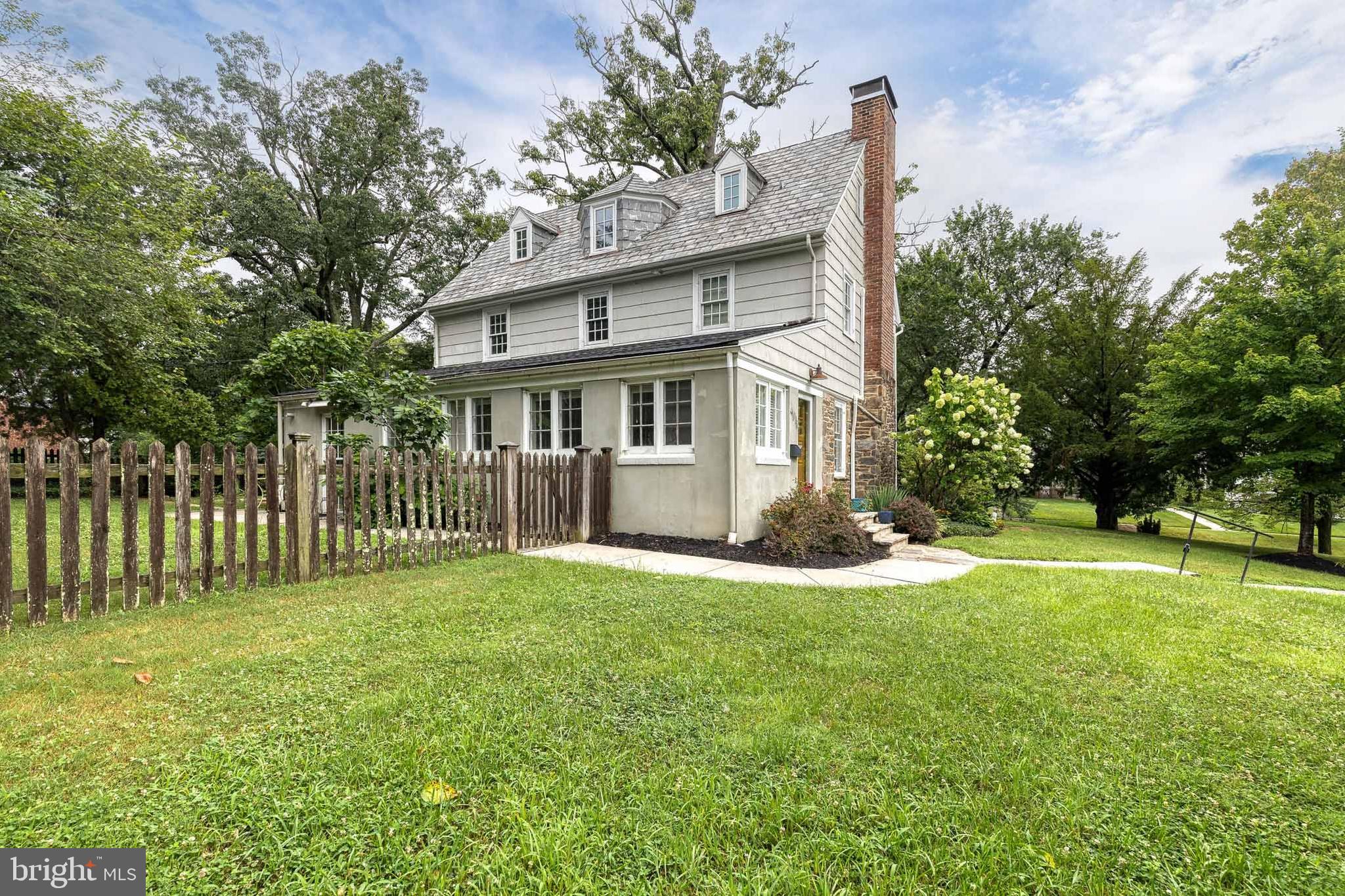 4010 Roundtop Road Baltimore, MD 21218 - Photo 45 of 51 a view of a house with a yard and fence