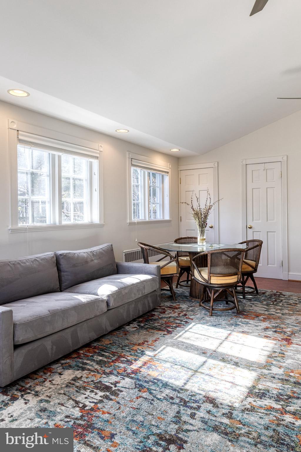 4010 Roundtop Road Baltimore, MD 21218 - Photo 10 of 51 a living room with furniture a rug and a window