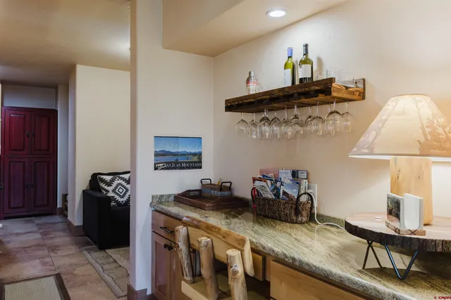 a bedroom with a bed and a closet