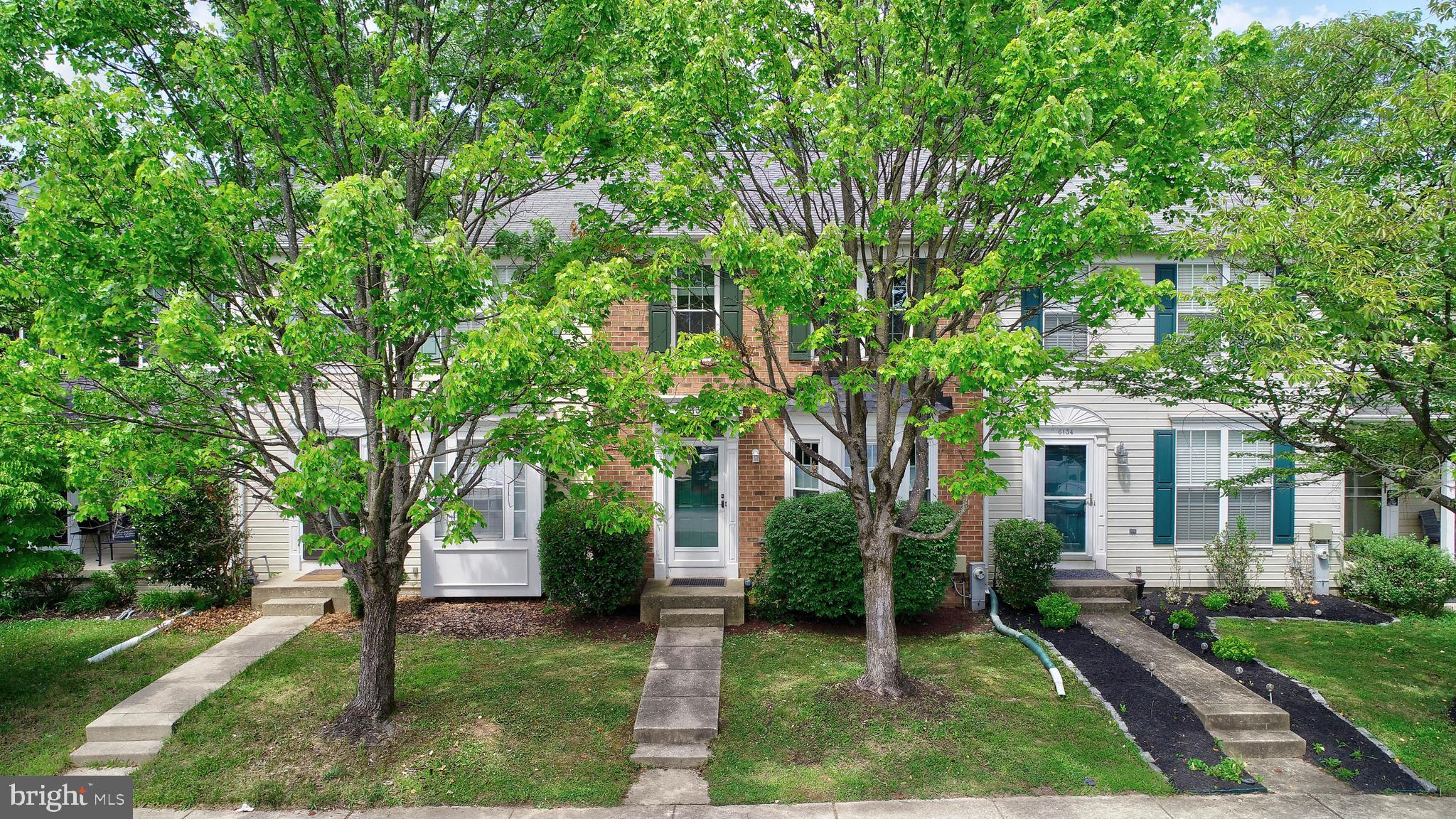 6136 Starburn Path Columbia, MD 21045 - Photo 1 of 35 front view of a house with a tree