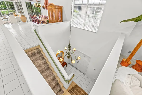 a view of a backyard with sitting area