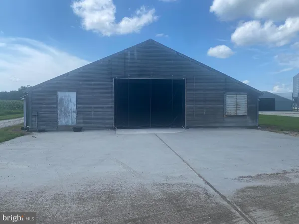 a front view of a house with a garage