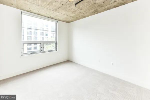 a view of a hallway with a white walls