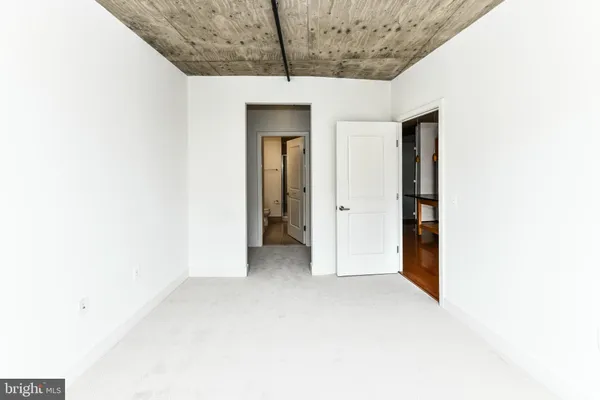 a view of a kitchen with a sink