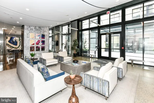 a view of a dining table and chairs