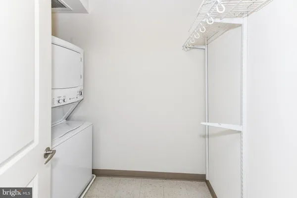 a view of hallway with wooden floor