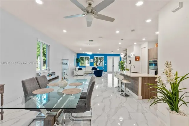 a view of a dining room with furniture