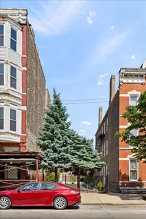 a cars parked in front of a building