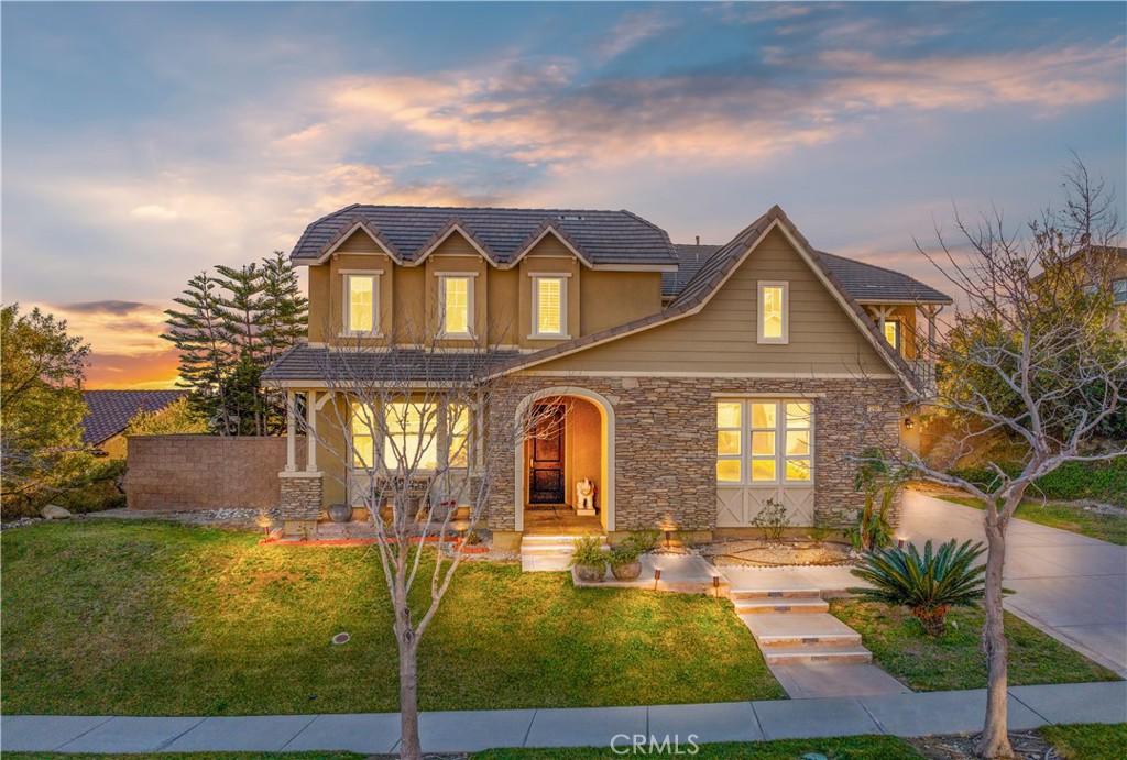 12607 Del Rey Drive Rancho Cucamonga, CA 91739 - Photo 1 of 1 a front view of a house with garden