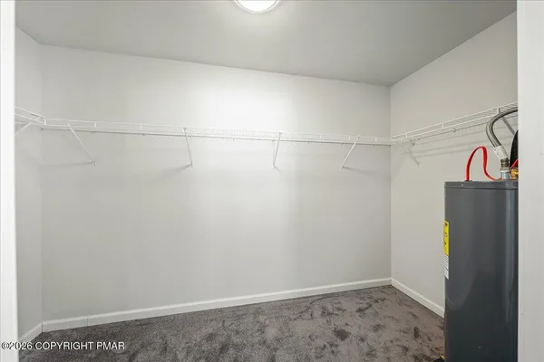 a view of a room with racks on the wall
