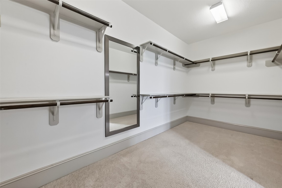 10514 Concha Lane Houston, TX 77096 - Photo 20 of 50 HUGE Walk-in closet in primary bedroom.