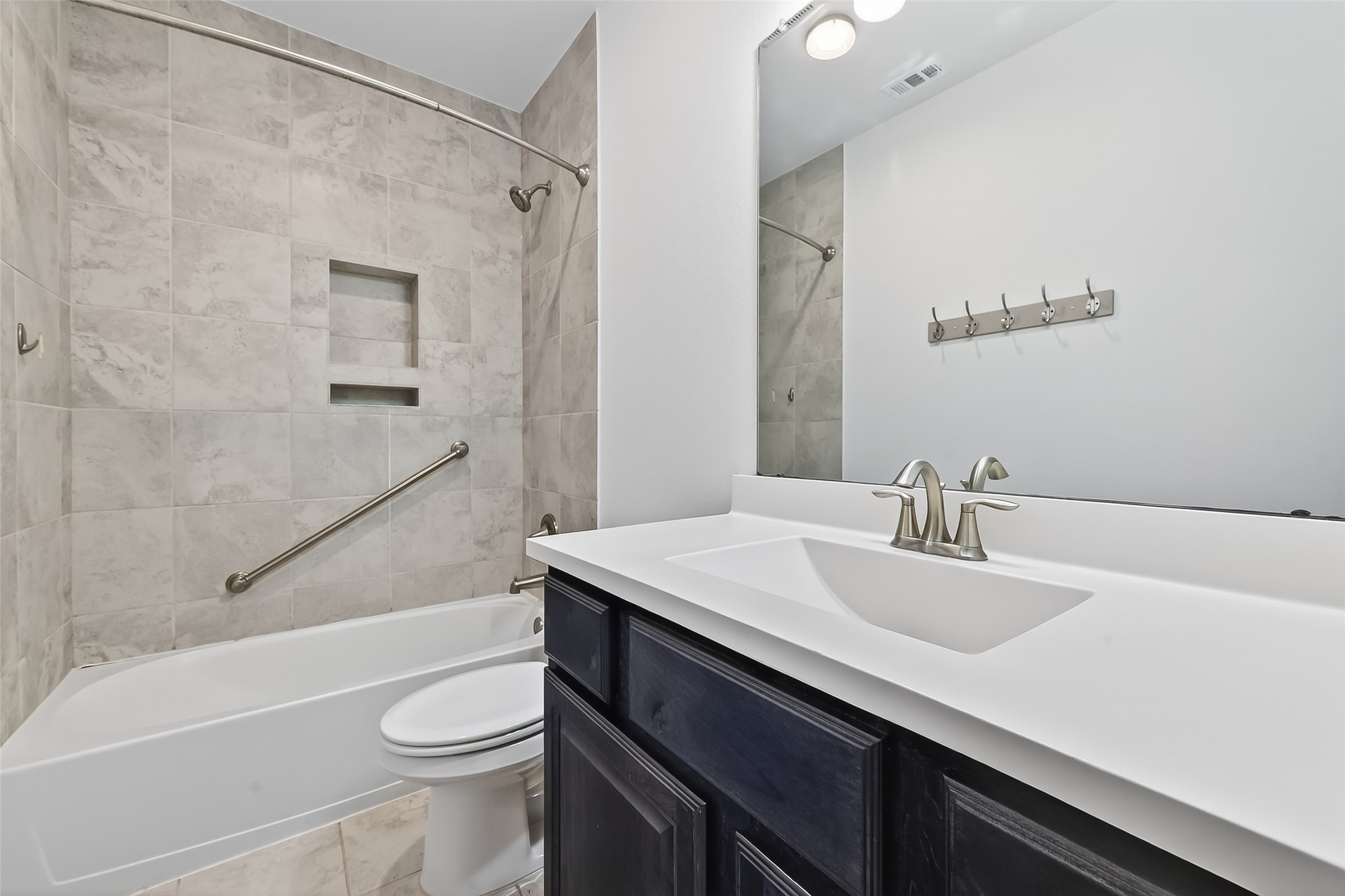 10514 Concha Lane Houston, TX 77096 - Photo 23 of 50 Hall bathroom with linen storage located on 2nd floor.
