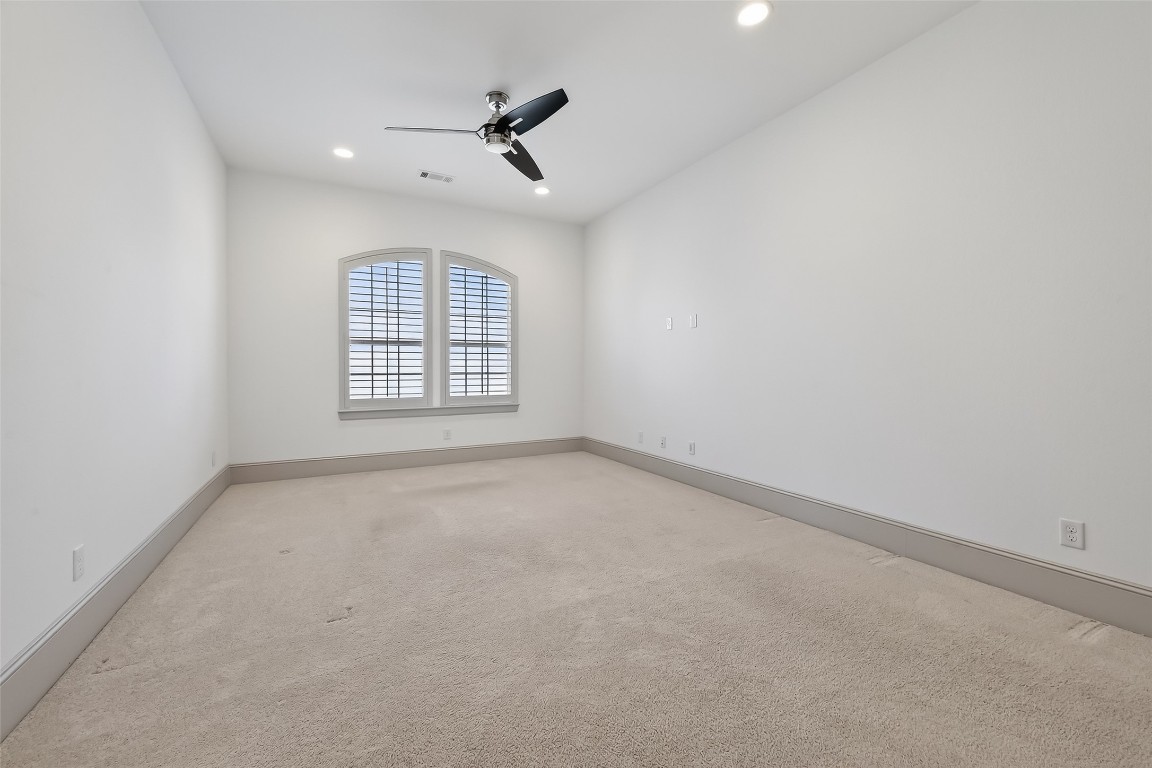 10514 Concha Lane Houston, TX 77096 - Photo 25 of 50 Family room with ceiling fans, recessed lights, plantation shutters, and storage closet located on the 2nd floor. This flex space would make a great playroom, home gym or a large home office space.