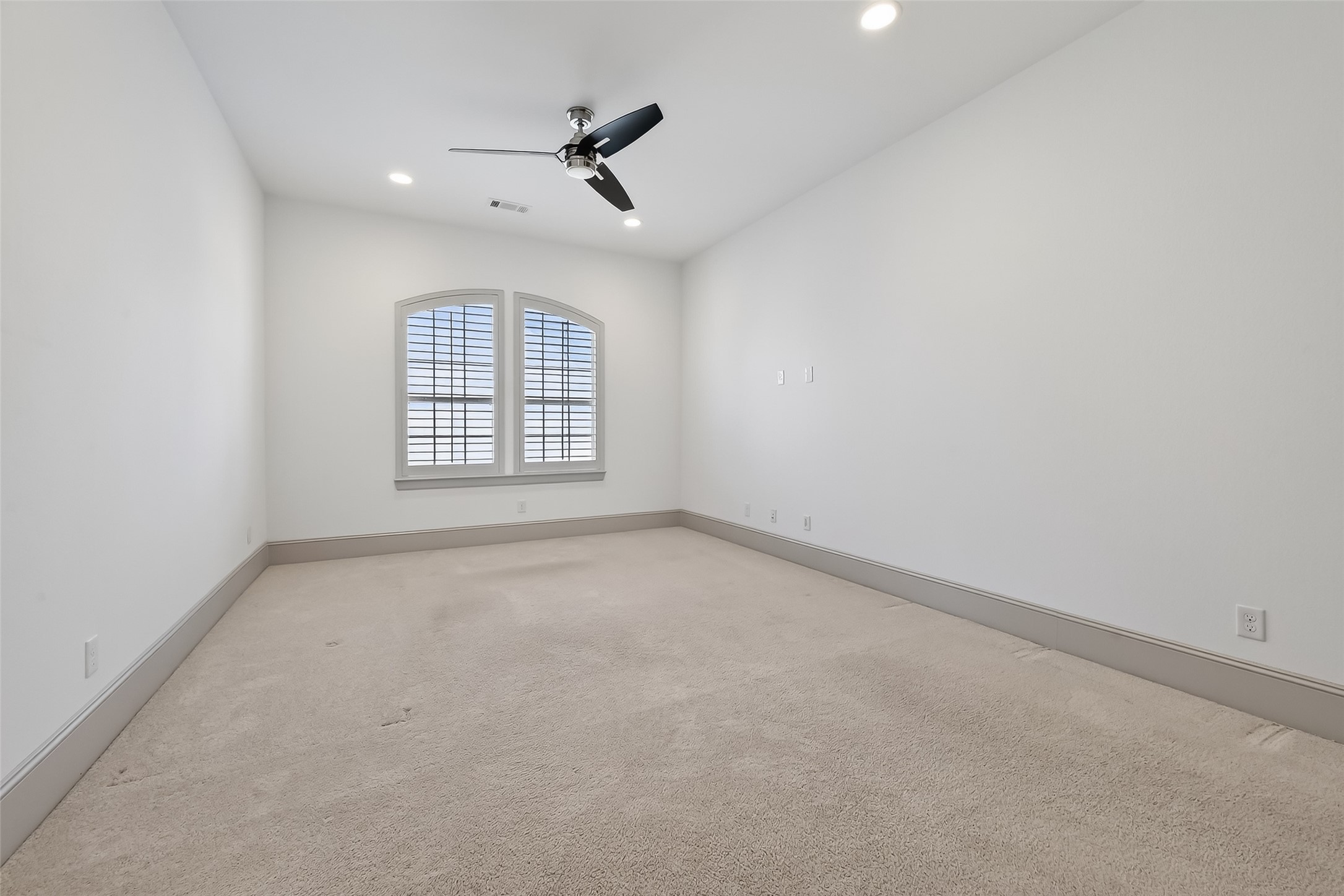 10514 Concha Lane Houston, TX 77096 - Photo 25 of 50 Family room with ceiling fans, recessed lights, plantation shutters, and storage closet located on the 2nd floor. This flex space would make a great playroom, home gym or a large home office space.
