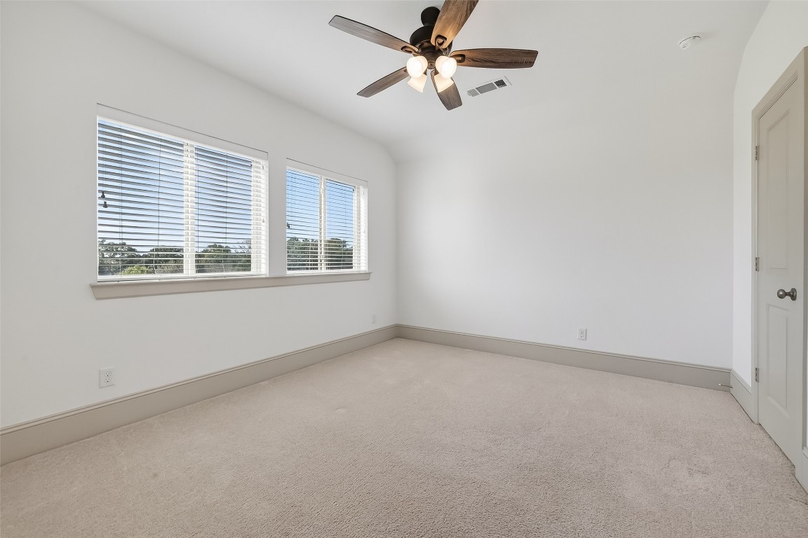 10514 Concha Lane Houston, TX 77096 - Photo 30 of 50 4th Bedroom located on the 3rd floor. Windows with 2 inch blinds. Great view of greenspace with no neighbors on the side.