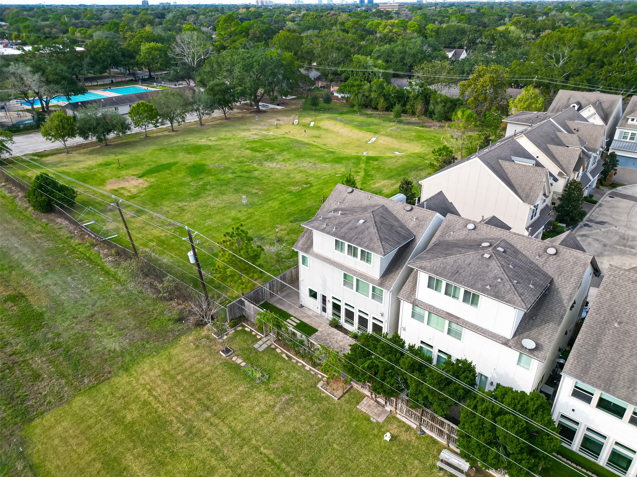 10514 Concha Lane Houston, TX 77096 - Photo 46 of 50 Notice the community pool is conveniently located nearby and a yearly membership can be purchased, if interested.