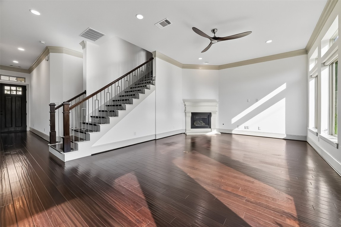 10514 Concha Lane Houston, TX 77096 - Photo 7 of 50 View of spacious living area with looking toward the front door & stairs.