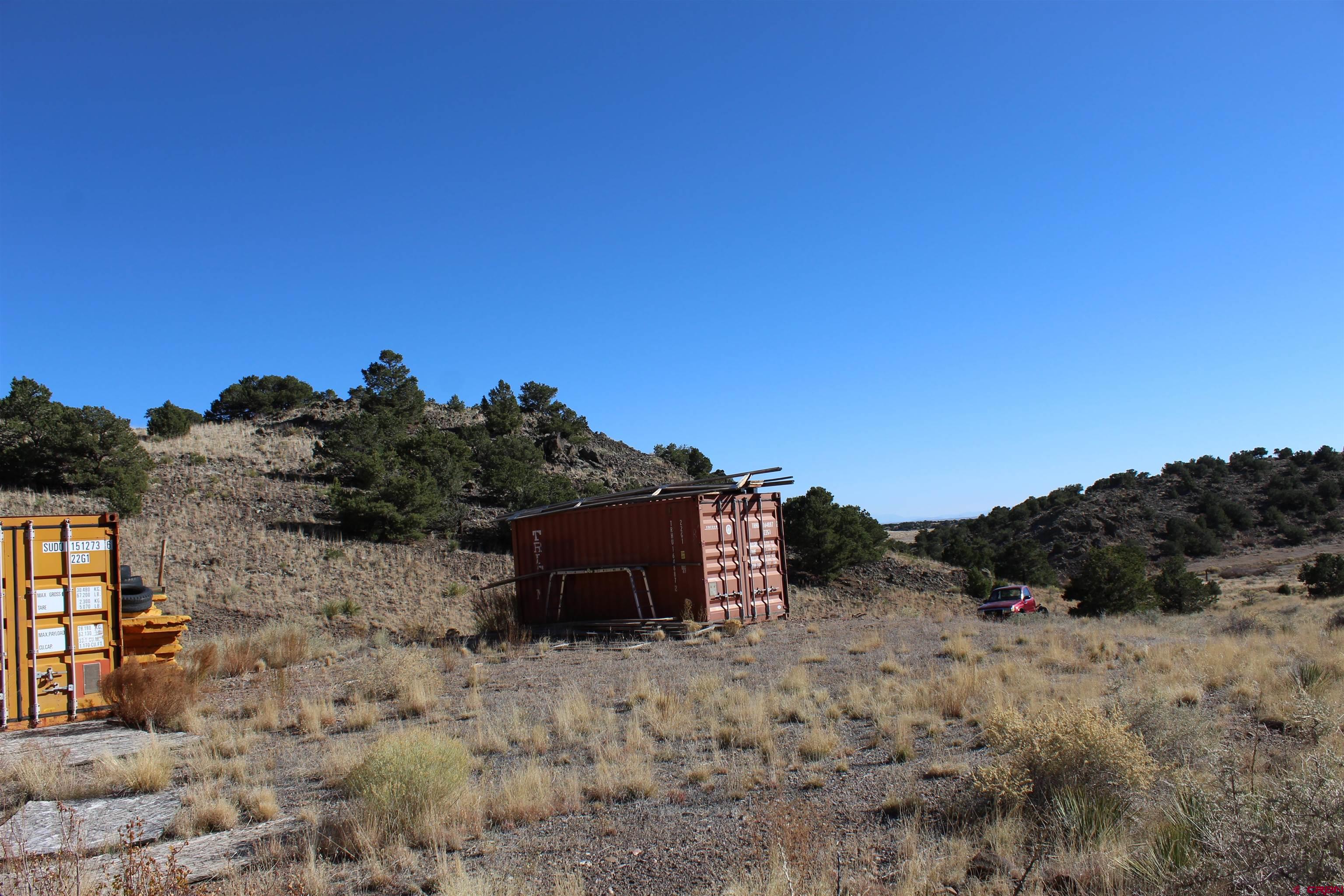7 Ghost Mine Ranch Del Norte, CO 81132 - Photo 18 of 35 a view of a dry yard with trees