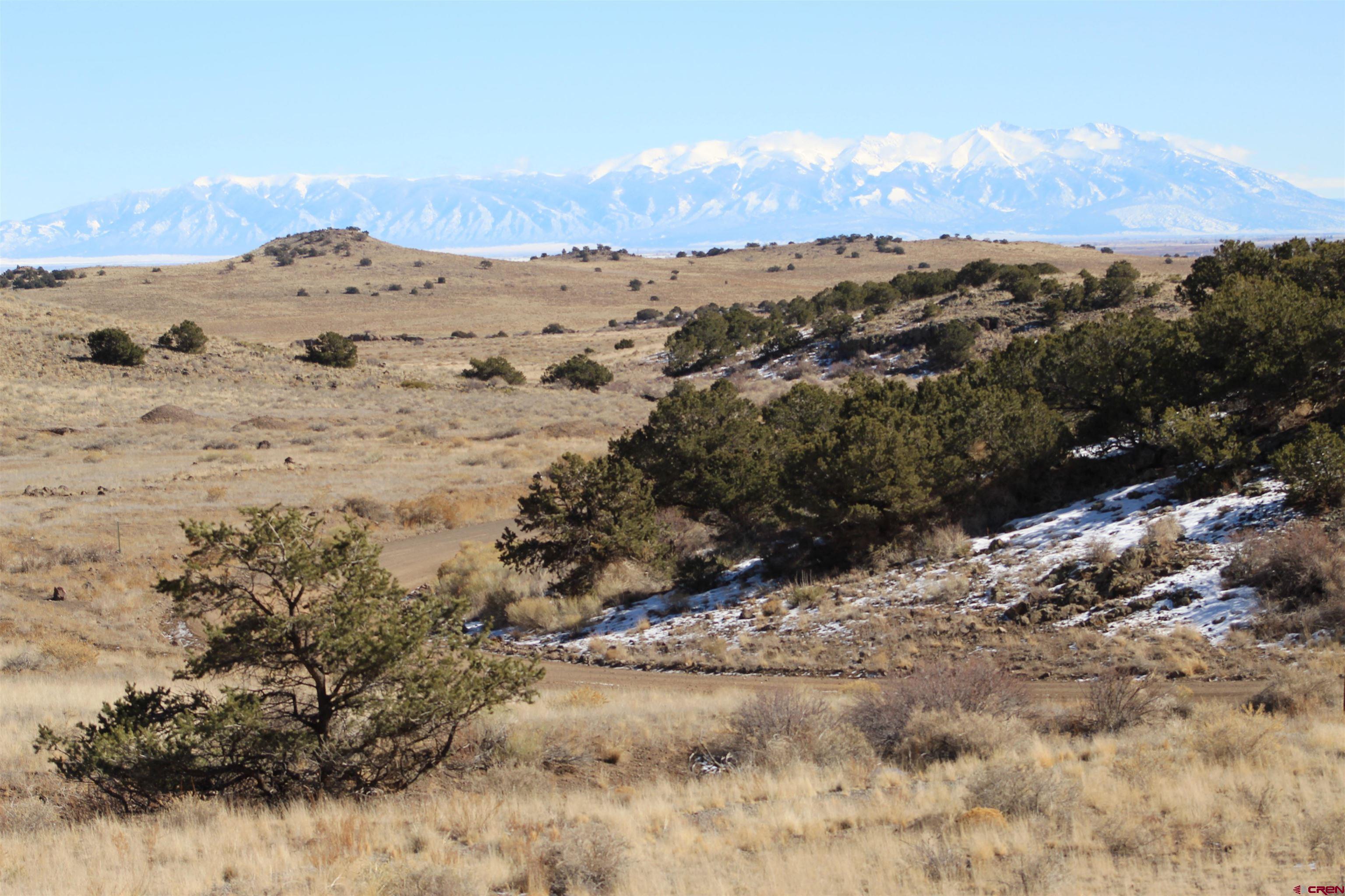 7 Ghost Mine Ranch Del Norte, CO 81132 - Photo 31 of 35 a view of a mountain from a yard