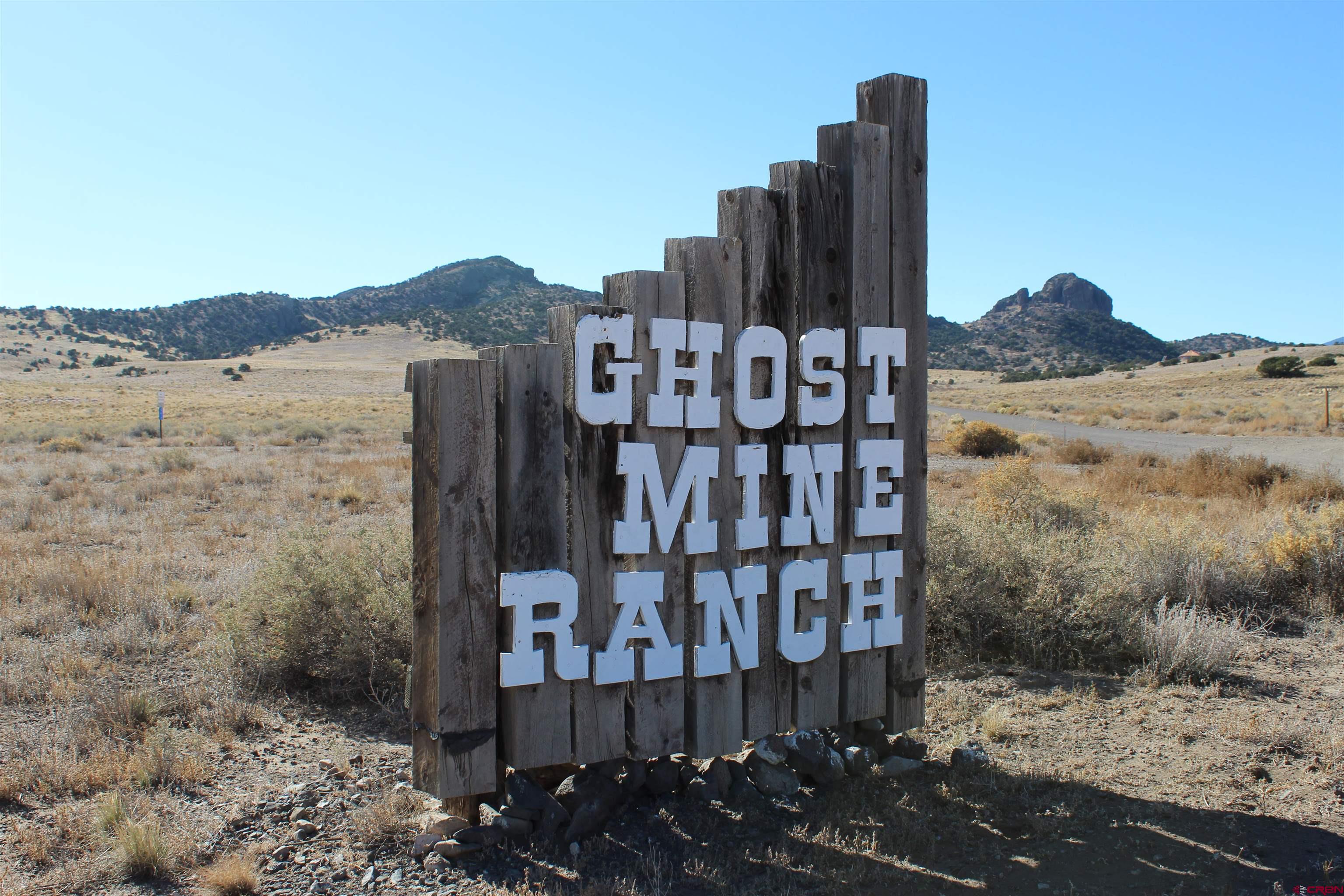 7 Ghost Mine Ranch Del Norte, CO 81132 - Photo 6 of 35 a view of a building with mountain view