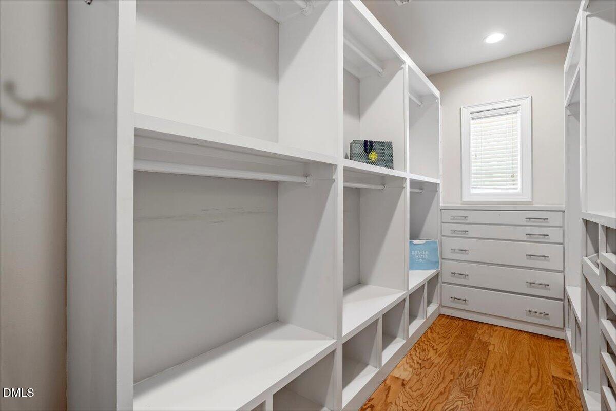 902 Ravendale Place Cary, NC 27513 - Photo 32 of 57 Primary Closet on main level