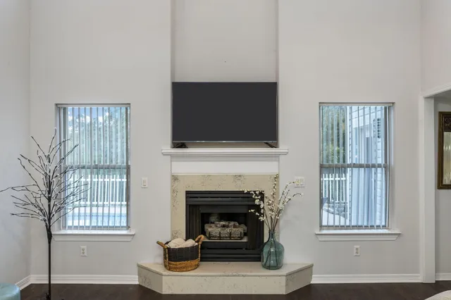 a kitchen with a sink refrigerator and cabinets