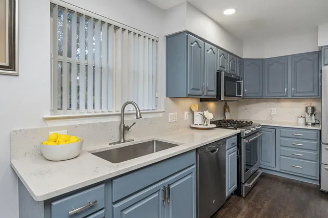 a bathroom with a sink and a window