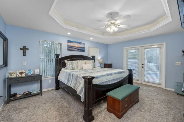 a bathroom with a sink vanity and mirror