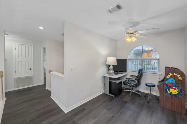 a room with toys and wooden floor